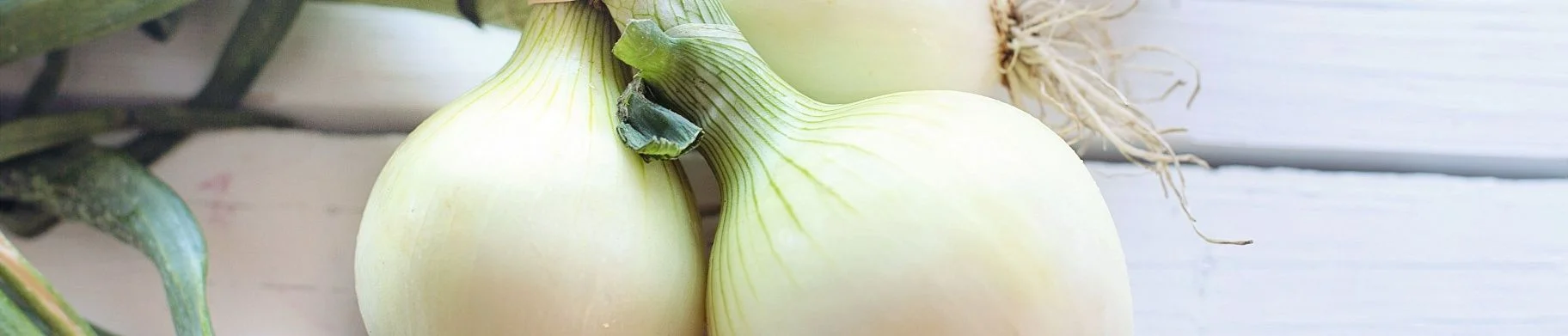 img: How does climate change affect the cultivation and storage of onions?